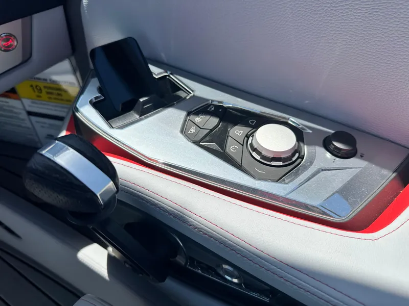 Slide: The Image of Control panel of 2025 Nautique Super Air Nautique G25 boat, featuring sleek design and modern controls. - 20