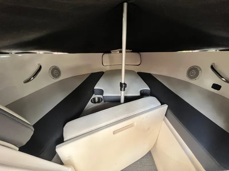 Slide: The Image of 2023 Bayliner VR4 Bowrider OB interior with seating and cup holders. - 35