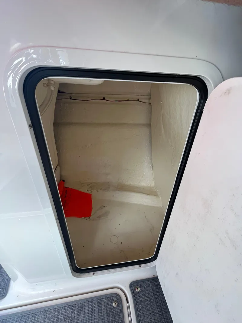 Slide: The Image of 2023 Bayliner VR4 Bowrider OB storage compartment with open hatch. - 36