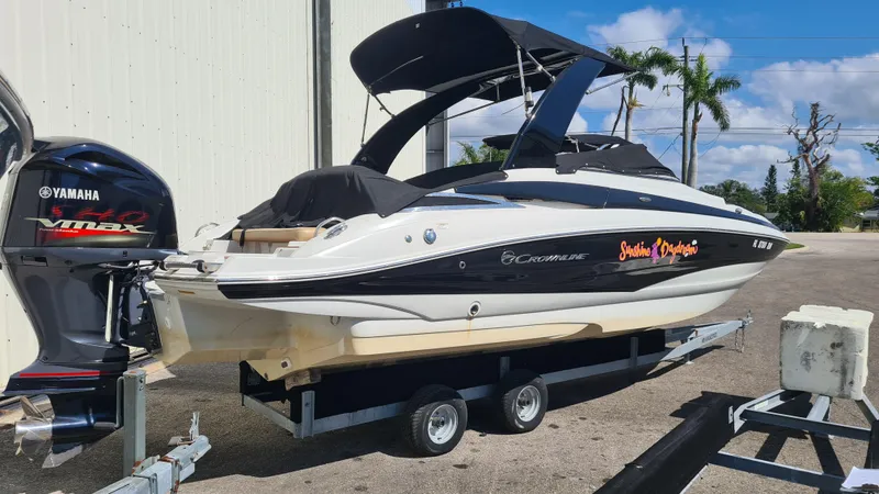Slide: The Image of 2018 Crownline Eclipse E24 XS boat on trailer with Yamaha Vmax engine. - 4