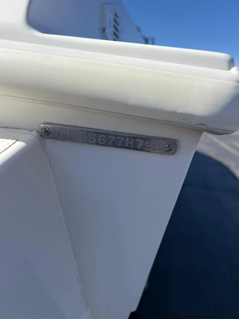 Slide: The Image of Close-up of a 1998 Velocity 260 boat hull identification number plate. - 10