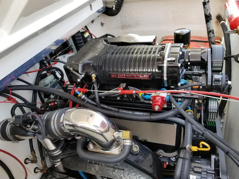 Slide: The Image of 1998 Velocity 260 engine with Whipple supercharger, detailed view of components and wiring. - 3