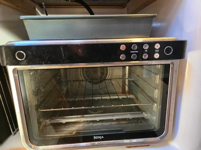 Slide: The Image of Freedom F-38 oven, 1991 model, with digital controls and spacious interior. - 33