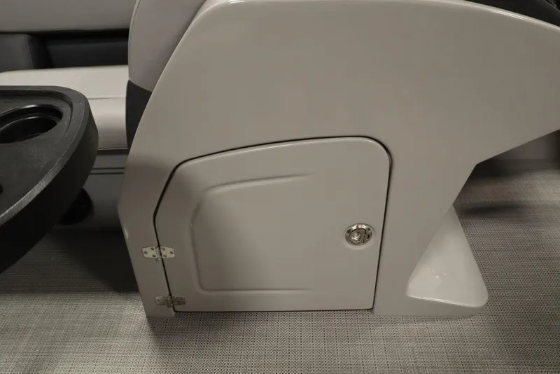Slide: The Image of 2025 Bentley Pontoons 200 CRUISE console storage compartment with cup holder. - 11