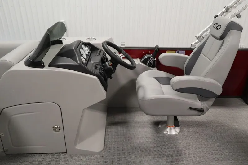 Slide: The Image of 2025 Bentley Pontoons 200 CRUISE helm with modern steering and comfortable captain's chair. - 18