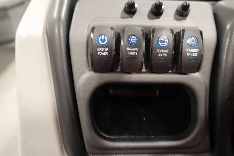 Slide: The Image of Control panel of 2025 Bentley Pontoons 200 CRUISE with power and light switches. - 23