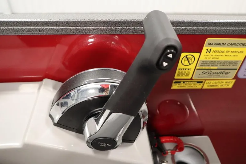 Slide: The Image of Throttle control of 2025 Bentley Pontoons 200 CRUISE with capacity warning labels. - 28