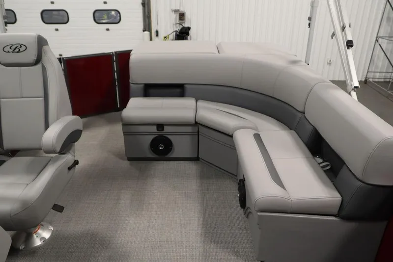 Slide: The Image of 2025 Bentley Pontoons 200 CRUISE interior with luxurious gray seating and modern design. - 29