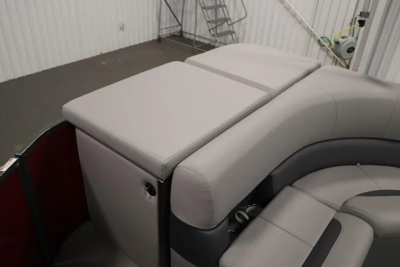 Slide: The Image of 2025 Bentley Pontoons 200 CRUISE interior with sleek gray seating and storage compartment. - 31