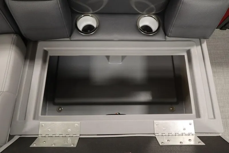 Slide: The Image of 2025 Bentley Pontoons 200 CRUISE storage compartment with cup holders and gray seating. - 36