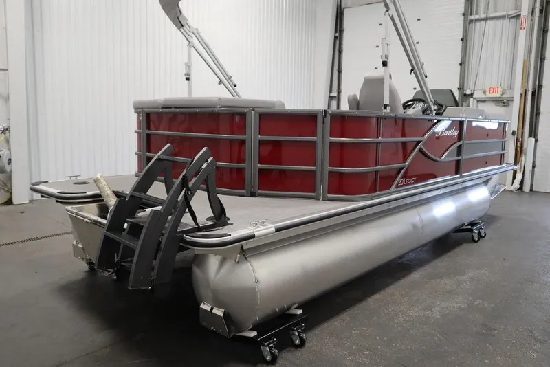 Slide: The Image of 2025 Bentley Pontoons 200 CRUISE in a showroom, featuring sleek red design and sturdy construction. - 7