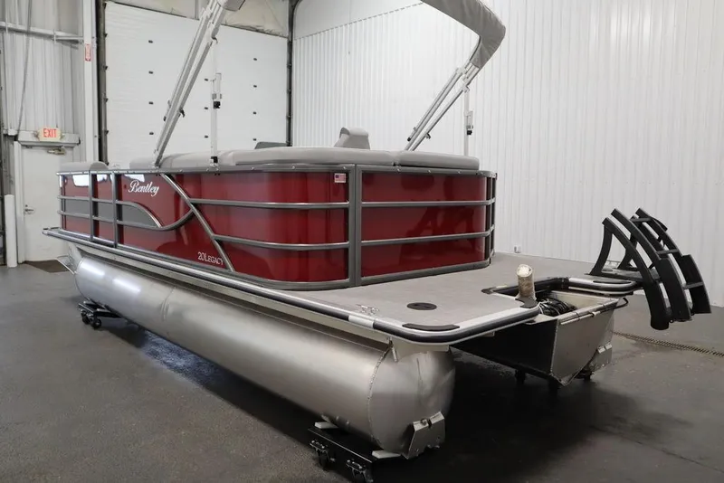 Slide: The Image of 2025 Bentley Pontoons 200 CRUISE in a showroom, featuring sleek red and silver design. - 8