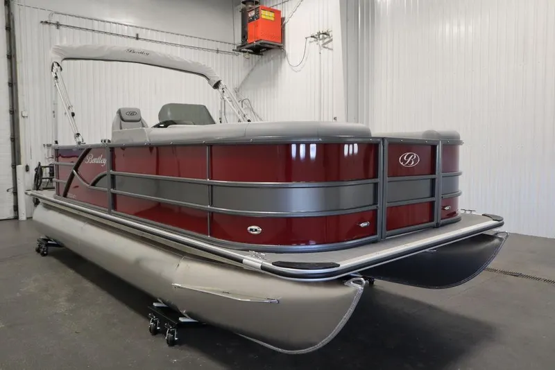 Slide: The Image of 2025 Bentley Pontoons 200 CRUISE in a showroom, featuring sleek design and modern amenities. - 9