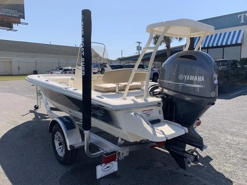 The Image of 2025 Scout 177 Sport boat on trailer at authorized dealer, The Boat Shop. - 1