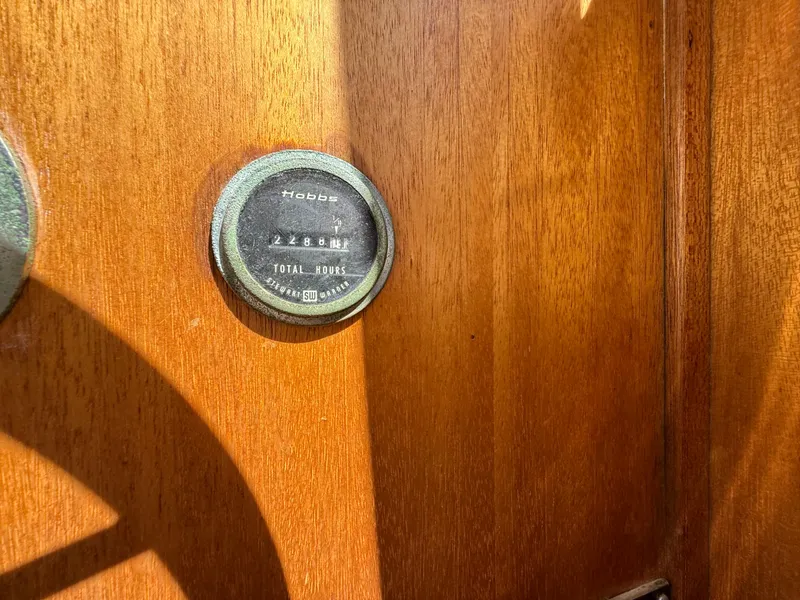 Slide: The Image of Hour meter on 1983 Californian 34 boat, mounted on wooden panel. - 35