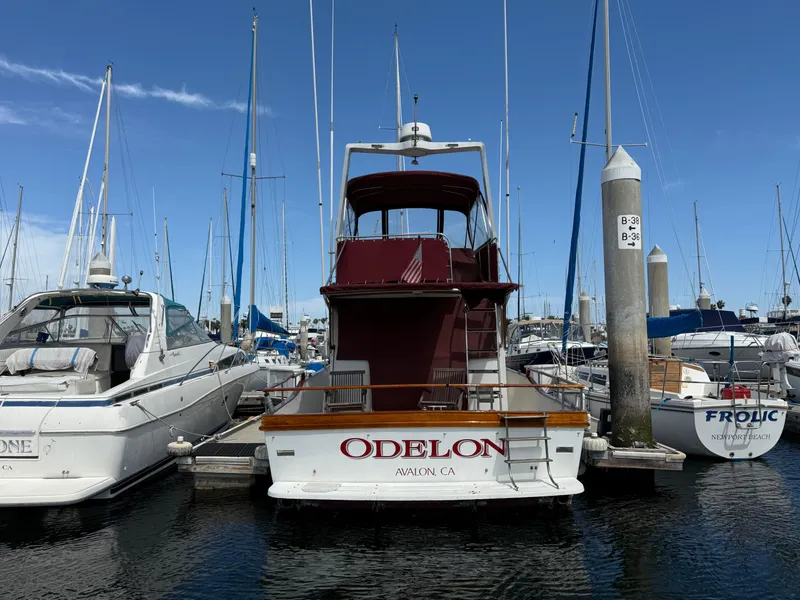 Slide: The Image of 1983 Californian 34 yacht named "ODELON" docked at a marina in Avalon, CA. - 6
