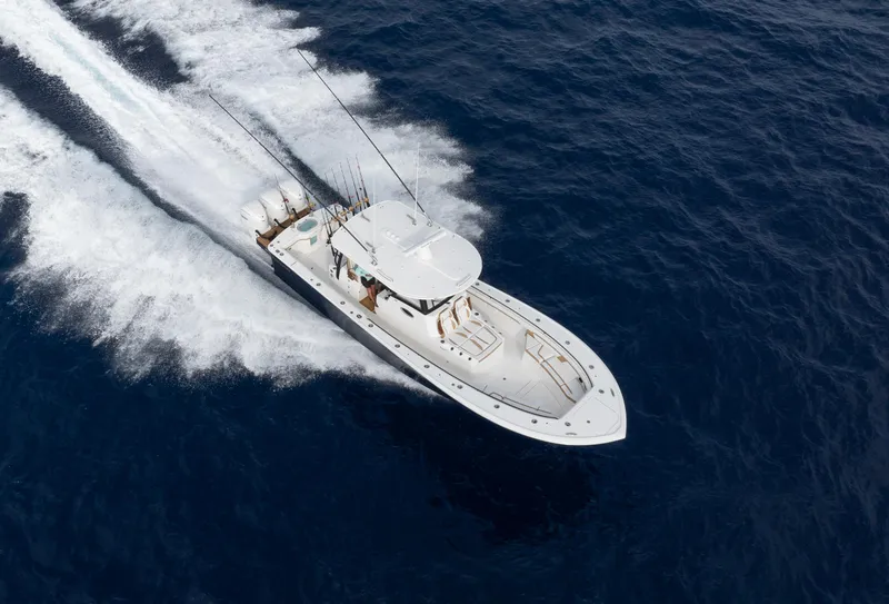 Slide: The Image of 2025 Regulator 35 boat cruising on open ocean waters. - 3
