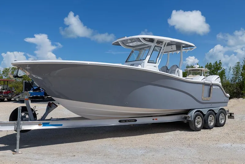 The Image of 2026 Sea Fox 288 Commander boat on trailer under clear blue sky. - 0