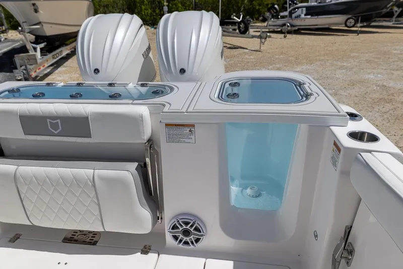 Slide: The Image of 2026 Sea Fox 288 Commander boat interior with dual engines and seating. - 11