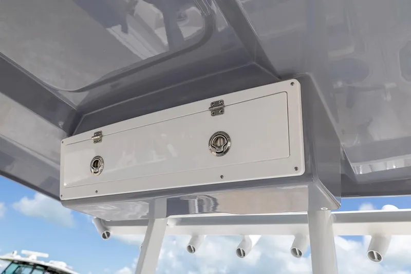 Slide: The Image of Storage compartment on 2026 Sea Fox 288 Commander boat, featuring secure latches and sleek design. - 16