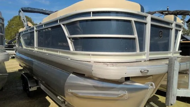 Slide: The Image of 2025 Godfrey Pontoons Sweetwater 2086 SB with 27" Impact Center Tube, side view. - 1