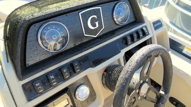 Slide: The Image of 2025 Godfrey Pontoons Sweetwater 2086 SB dashboard with steering wheel and controls. - 10