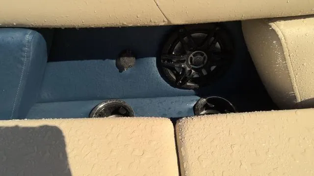 Slide: The Image of 2025 Godfrey Pontoons Sweetwater 2086 SB interior with speakers and cup holders. - 4