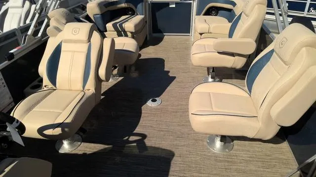 Slide: The Image of 2025 Godfrey Pontoons Sweetwater 2086 SB interior with beige seating and spacious layout. - 6