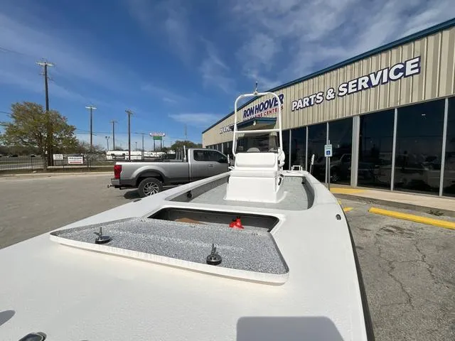 Slide: The Image of 2025 Majek 2206 Illusion boat outside Ron Hoover Parts & Service center. - 2