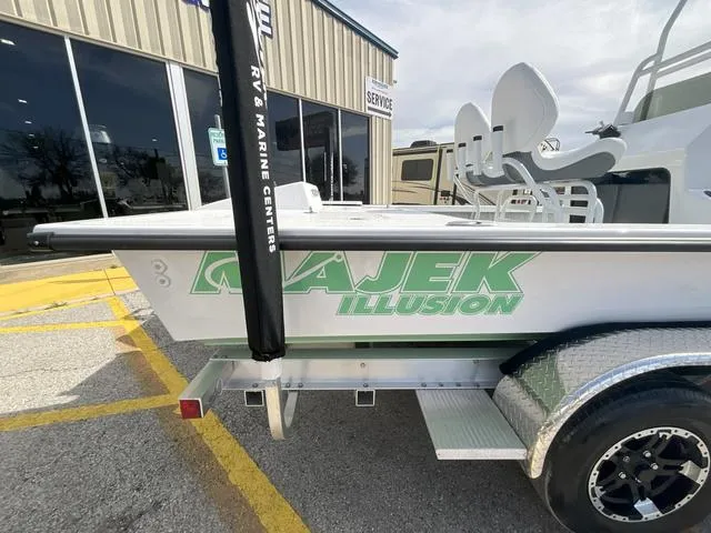 Slide: The Image of 2025 Majek 2206 Illusion boat on trailer outside service center. - 4