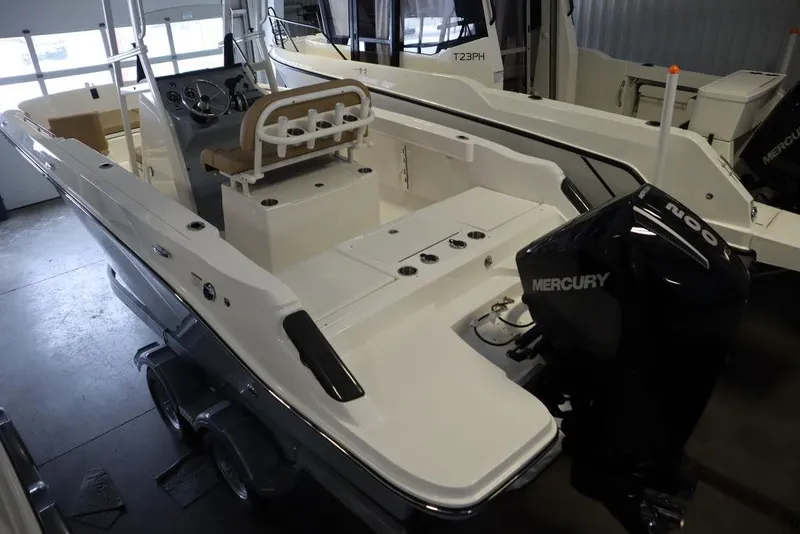Slide: The Image of 2025 Bayliner 22 CC Trophy boat with Mercury engine in showroom. - 3