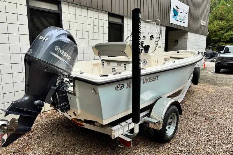 Slide: The Image of 2025 Key West 1720 Center Console boat with Yamaha 90 engine on trailer. - 2