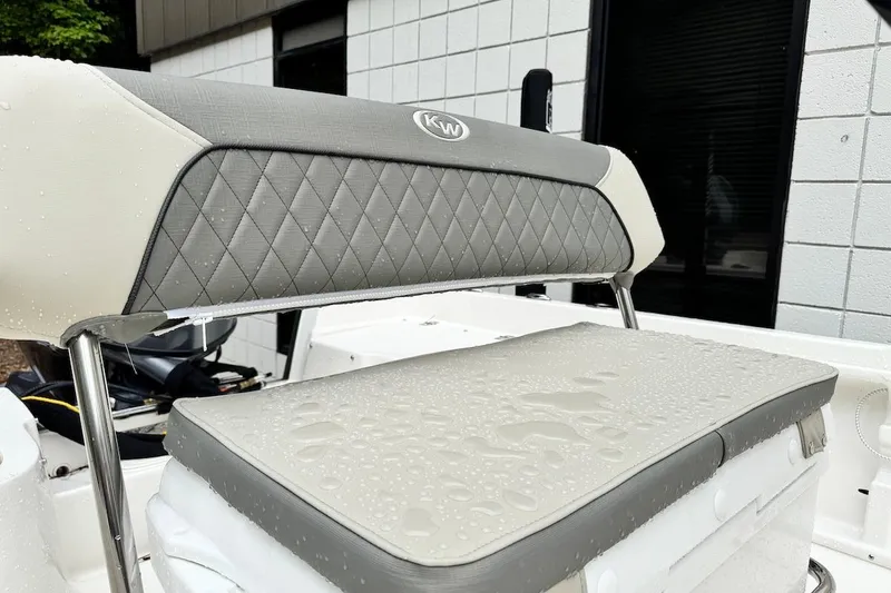 Slide: The Image of 2025 Key West 1720 Center Console boat seat with water droplets, showcasing modern design. - 6