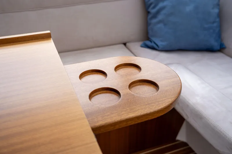 Slide: The Image of Interior of 2017 Nimbus 365 Coupe with wooden table and cup holders. - 20