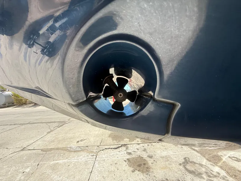 Slide: The Image of Close-up of a 2020 Jeanneau Leader 9.0 WA boat's propeller system. - 24