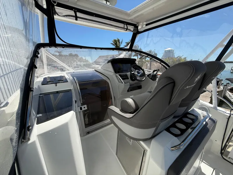 Slide: The Image of 2020 Jeanneau Leader 9.0 WA cockpit with modern controls and comfortable seating. - 38