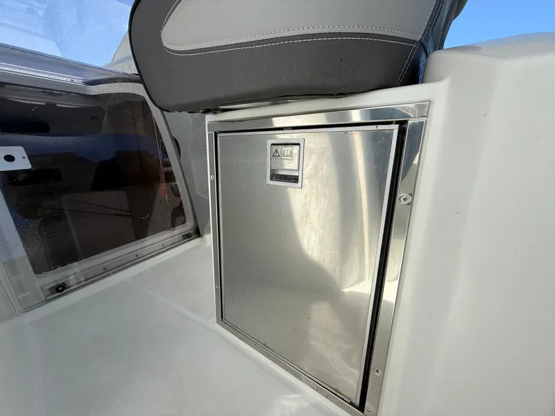 Slide: The Image of 2020 Jeanneau Leader 9.0 WA interior with stainless steel storage compartment. - 39