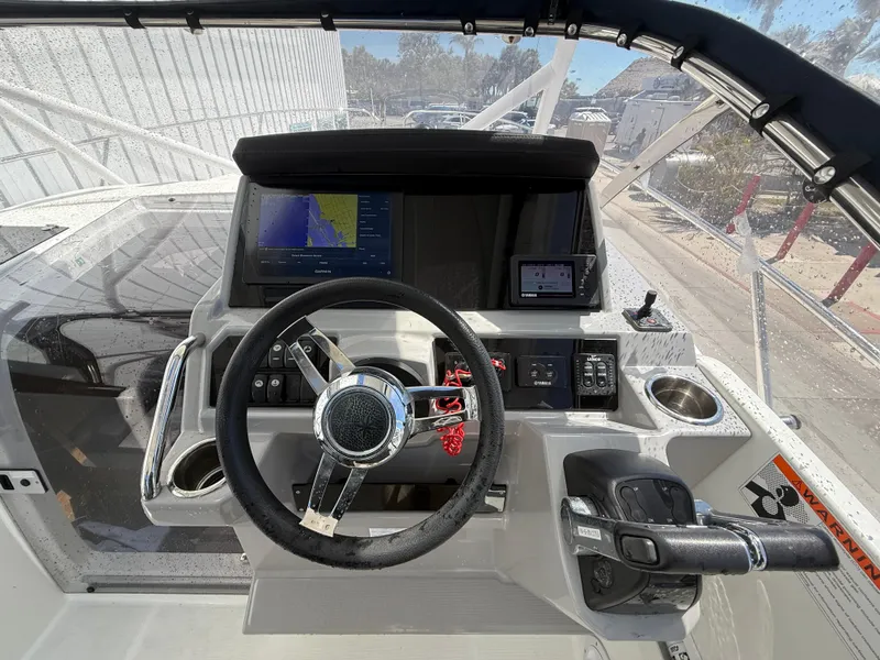 Slide: The Image of Cockpit view of 2020 Jeanneau Leader 9.0 WA with modern navigation equipment. - 46