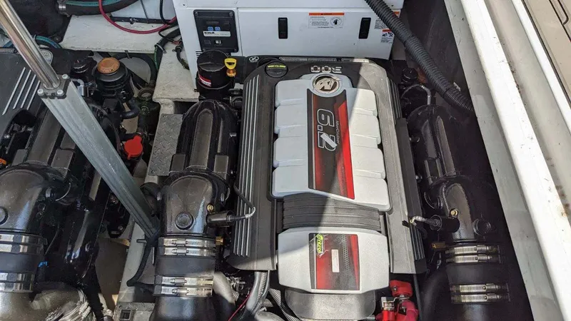Slide: The Image of Engine compartment of a 2014 Regal 35 Sport Coupe, featuring a powerful 6.2-liter engine. - 10