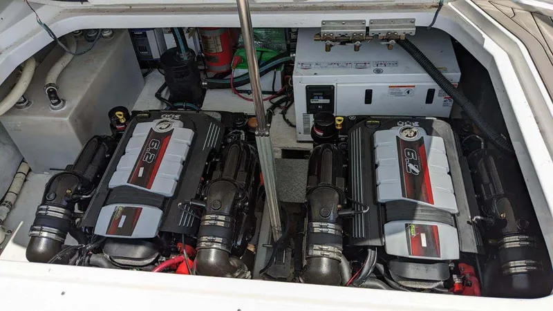 Slide: The Image of Engine compartment of a 2014 Regal 35 Sport Coupe with dual engines. - 12
