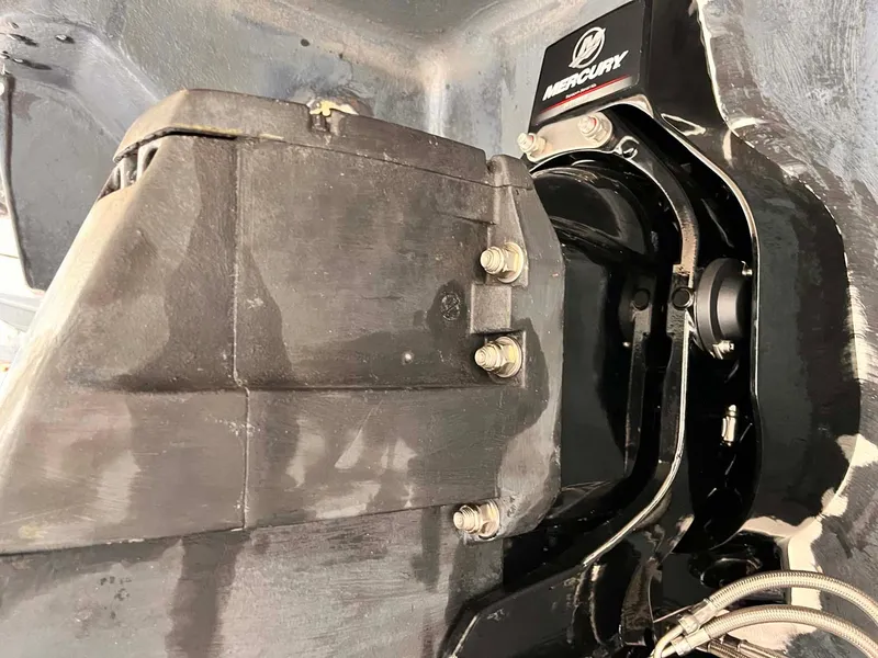 Slide: The Image of 2014 Regal 35 Sport Coupe engine compartment with Mercury components. - 13