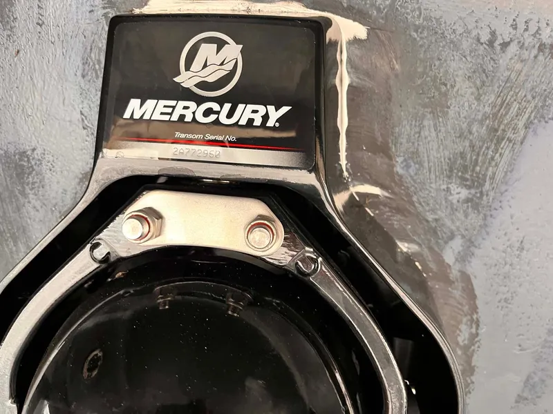 Slide: The Image of Close-up of a Mercury engine part on a 2014 Regal 35 Sport Coupe. - 18