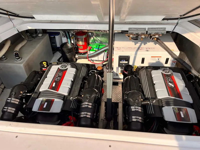 Slide: The Image of Engine compartment of a 2014 Regal 35 Sport Coupe with twin engines and equipment. - 8