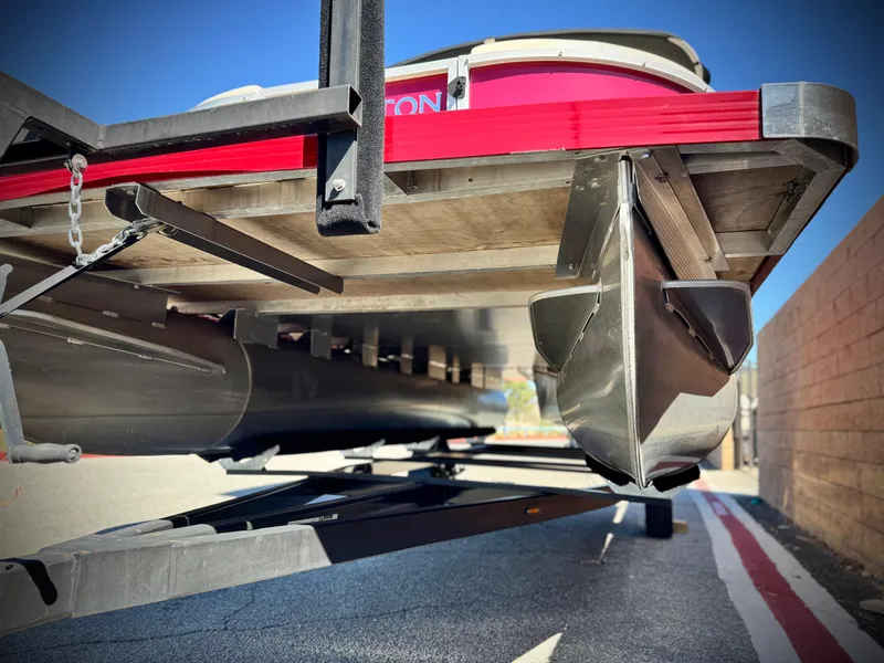Slide: The Image of 2023 Lexington 321 CRUISE pontoon boat underside view on trailer. - 3