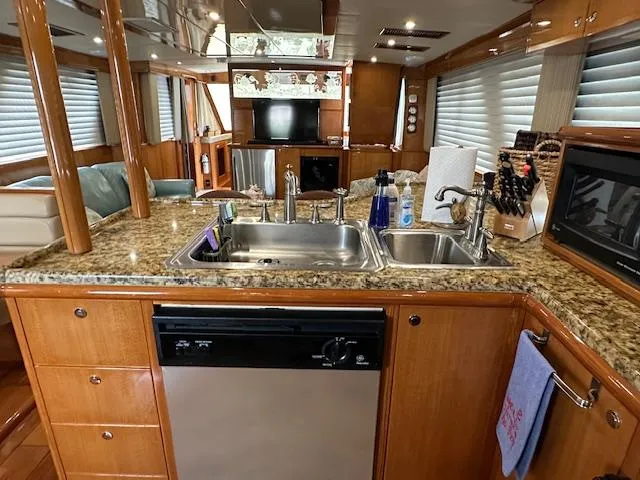 Slide: The Image of Luxurious kitchen interior of 2000 Jefferson Marquessa 60 MY yacht with granite countertops. - 10