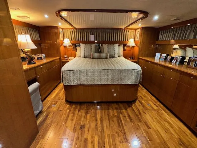 Slide: The Image of Luxurious bedroom interior of 2000 Jefferson Marquessa 60 MY yacht with wood flooring. - 16