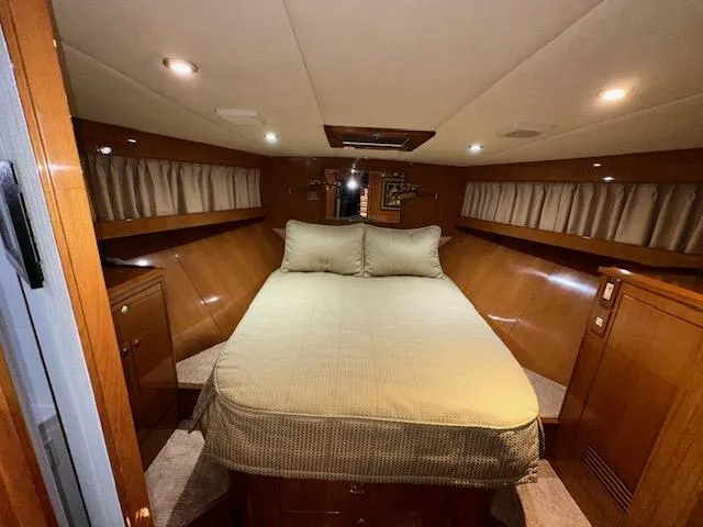 Slide: The Image of Luxurious bedroom interior of 2000 Jefferson Marquessa 60 MY yacht with cozy bedding. - 18