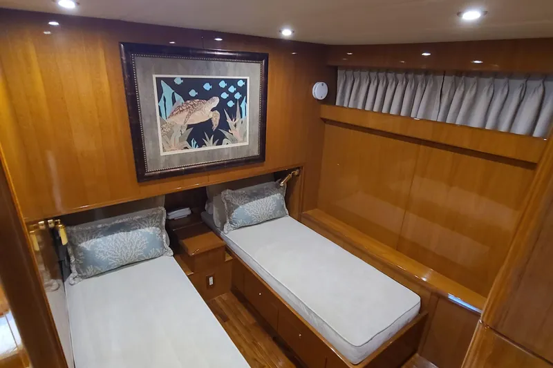Slide: The Image of Twin cabin with wood paneling in 2000 Jefferson Marquessa 60 MY yacht. - 19