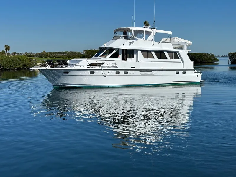 Slide: The Image of 2000 Jefferson Marquessa 60 MY yacht on calm water under clear blue sky. - 2
