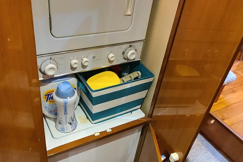 Slide: The Image of Laundry area on a 2000 Jefferson Marquessa 60 MY yacht with supplies and storage. - 20